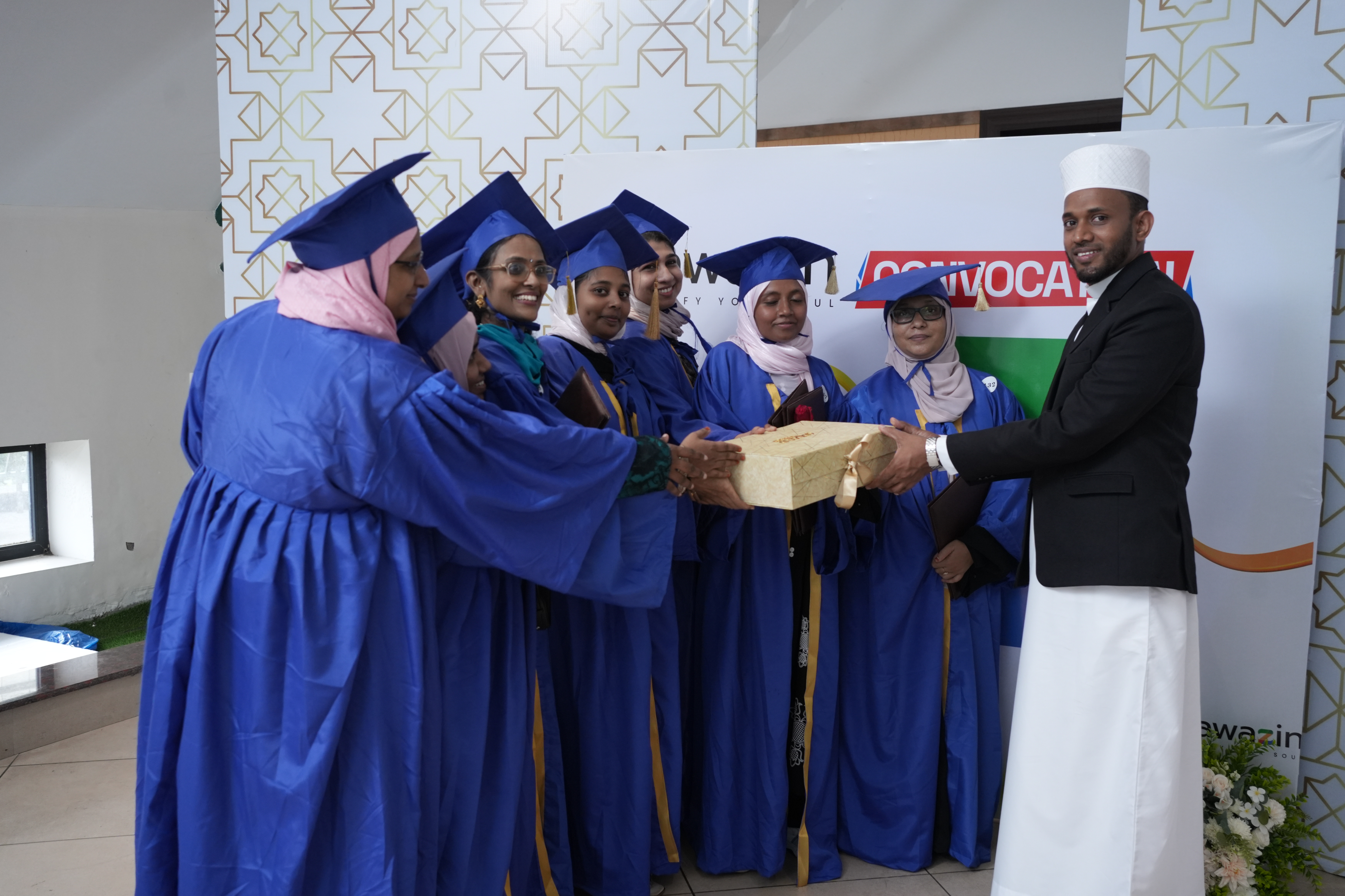 Gift being presented to graduates